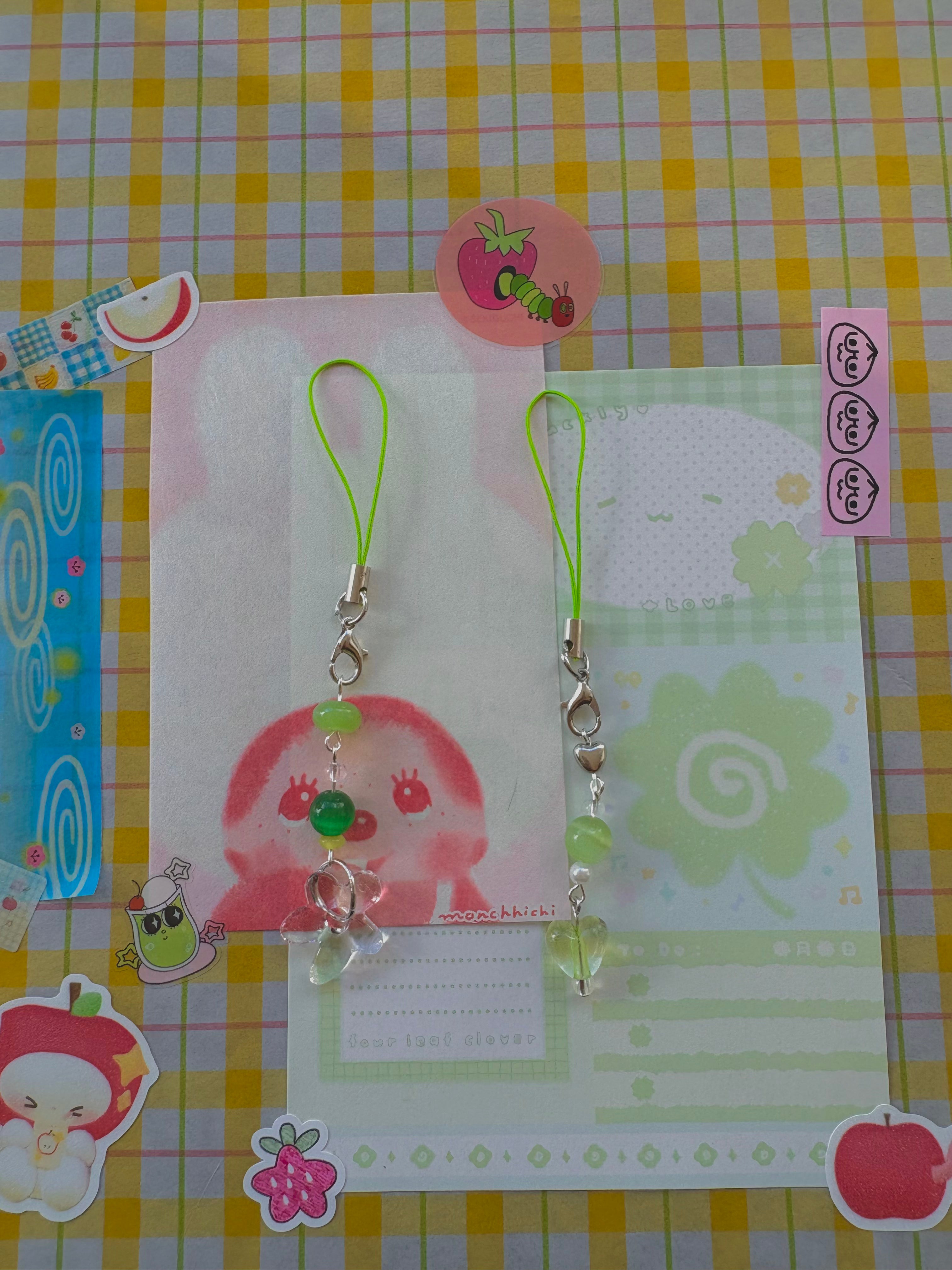 green phone charms •.°⋆:🍀:࿔*:･