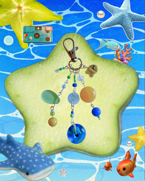 Keychain with colourful beads on a blue underwater-themed background